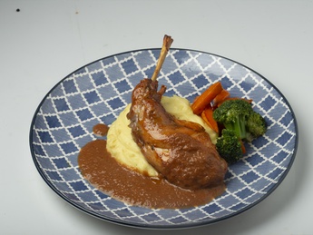 Rabbit with mashed potatoes and vegetables