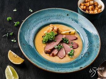 Lentil cream-soup with smoked duck slices