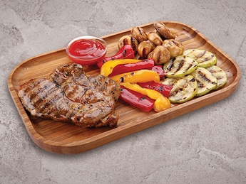 Pork steak with garnish of your choice