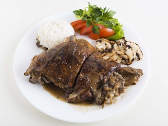 Baked young lamb with rice with liver