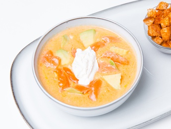 Cream soup with salmon and avocado