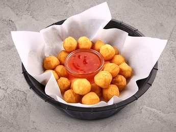 Potato balls with sauce