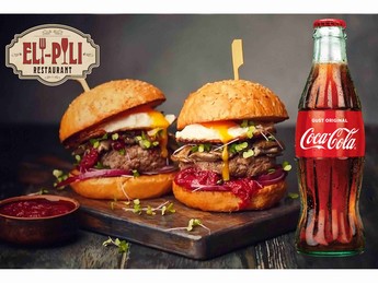 Eli Pili offers a beverage for free